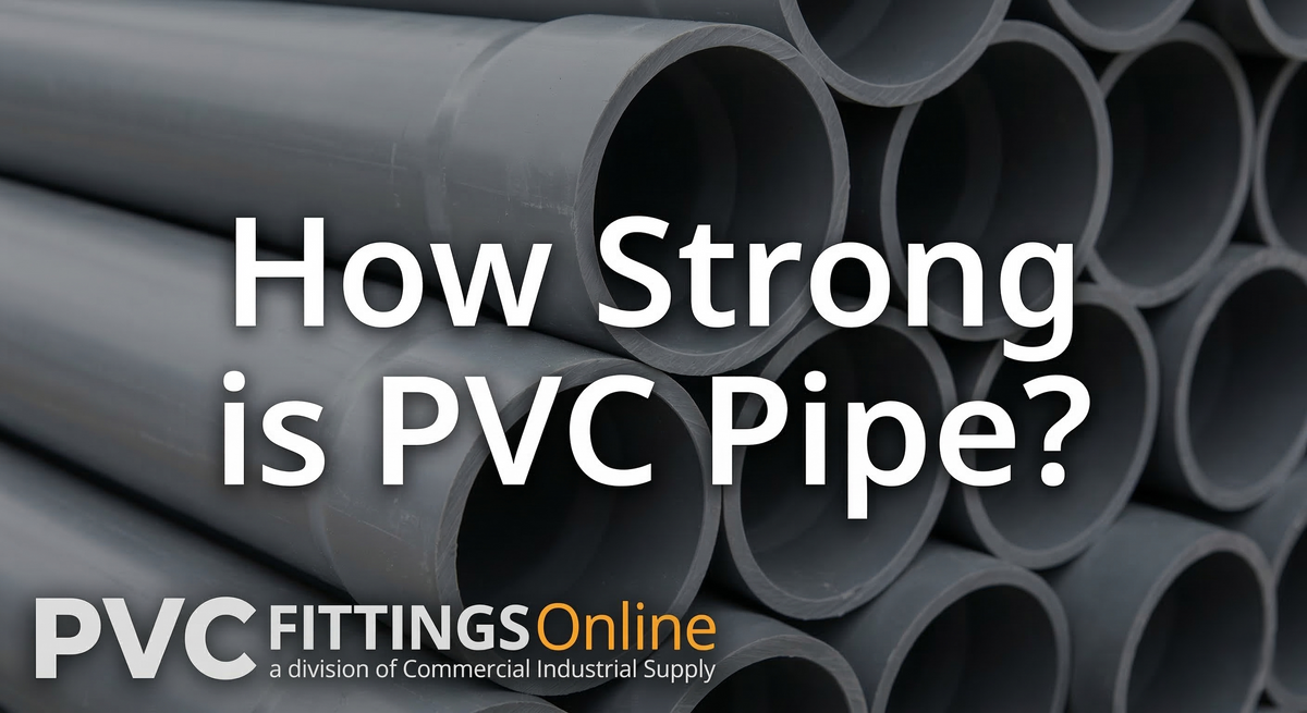 A stack of industrial grey PVC pipes with large white text in the center reading 